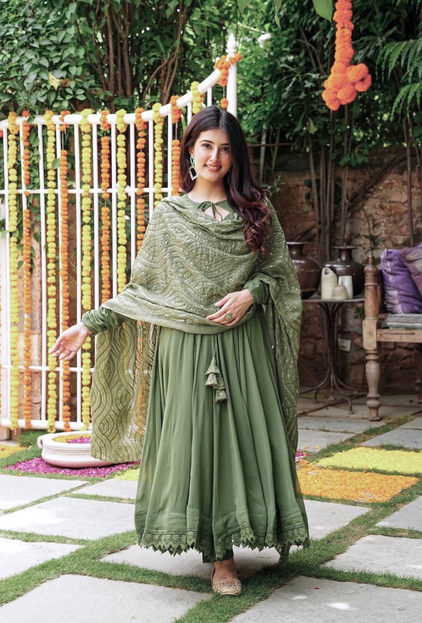 Ceremony Wear Mehndi Color Gown With Work Dupatta